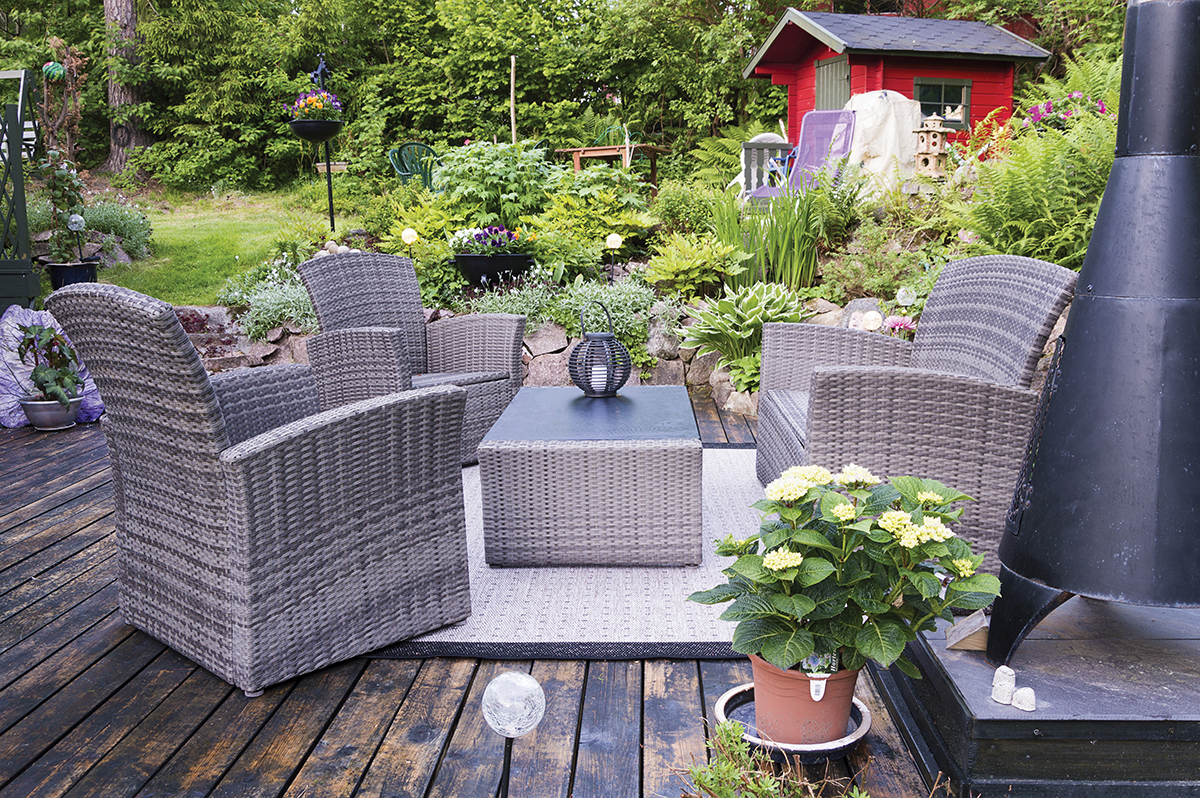 shutterstock 20976494 - house patio with wicker chairs
