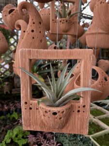 Homeowners can use Terra Fina planters as hanging displays in window boxes and other small areas, then relocate them outdoors during warmer months. Photo courtesy of Big Grass.